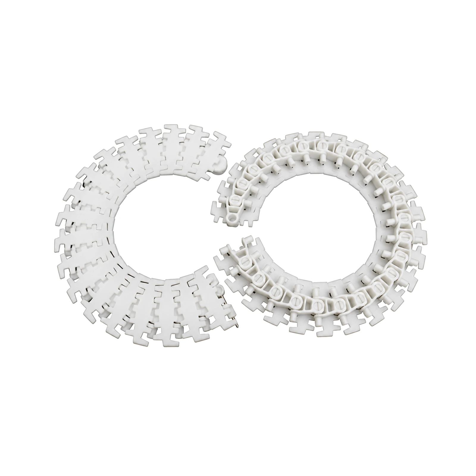Two curved runs of white flexible conveyor chain