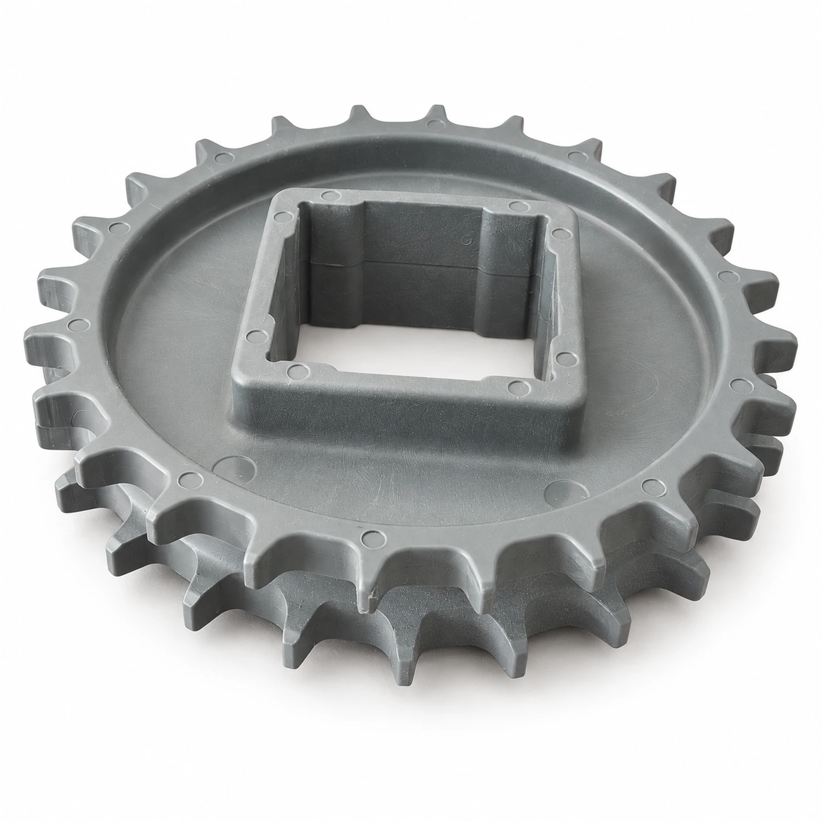 Close-up of a gray double-row sprocket with square bore